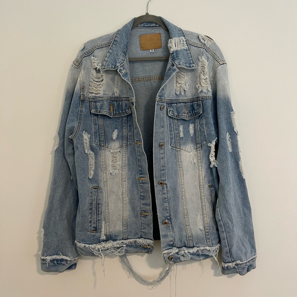 Distressed denim jacket